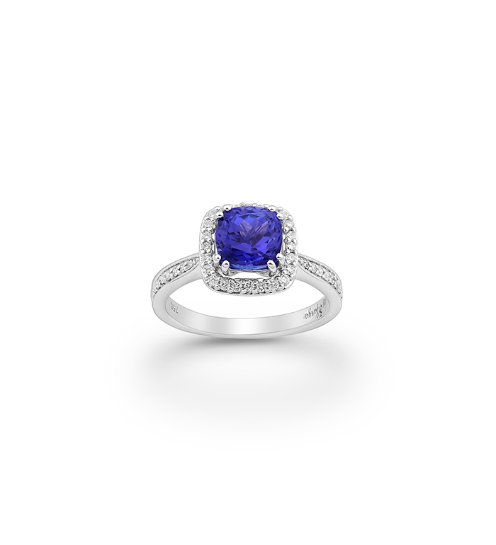 33-0066 - Halo Engagement Ring in 18K White Gold, Decorated with Tanzanite and Diamonds.