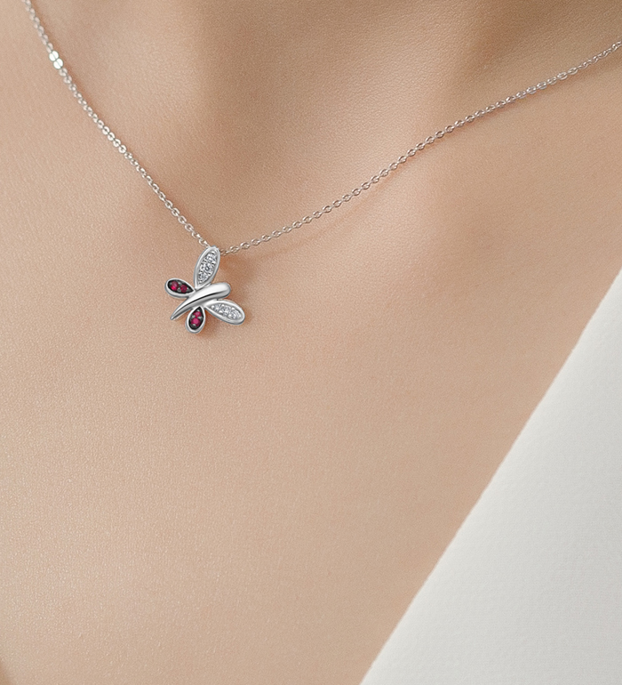 33-0090 - Butteryfly Necklace in 18K White Gold, Decorated with Diamonds and Ruby.